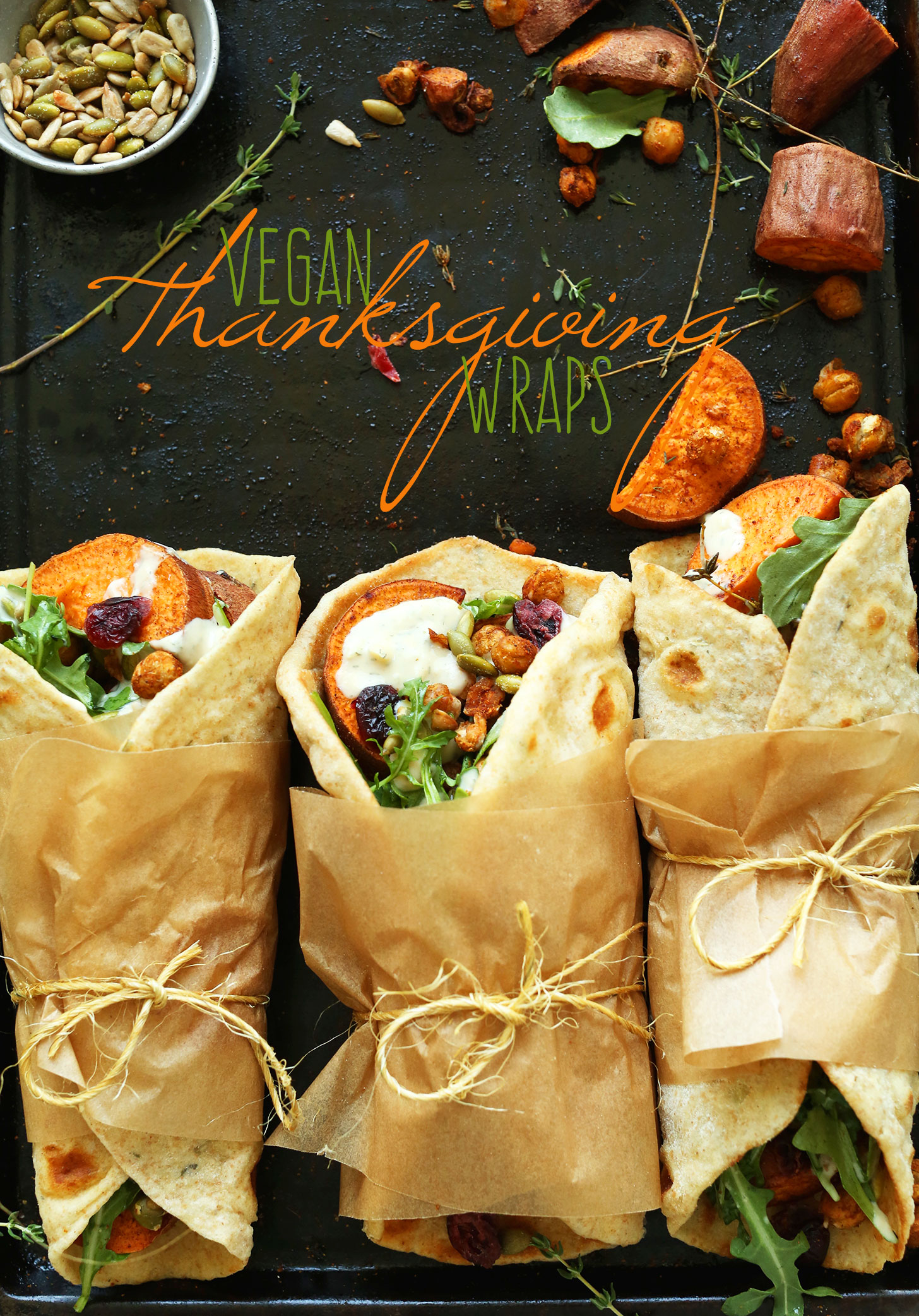 Baking sheet with vegan Thanksgiving Wraps filled with fall goodies