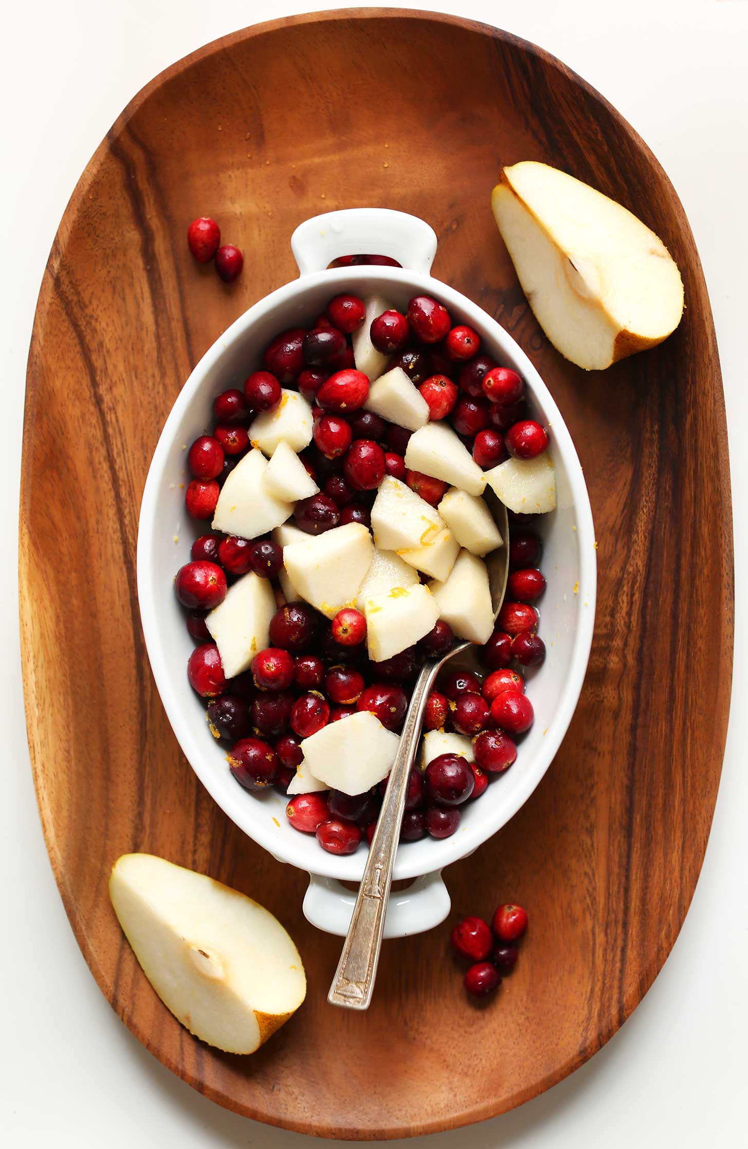 Stirring together pears and cranberries for a Cranberry-Pear Reduction