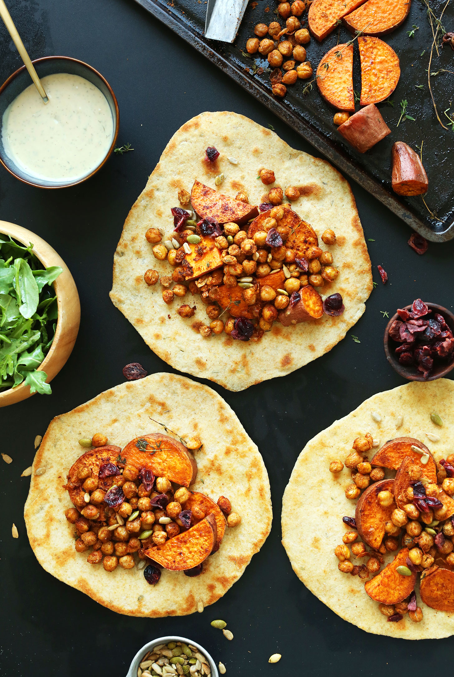 Vegan Thanksgiving wraps made with chickpeas, sweet potatoes, cranberries, and fresh greens