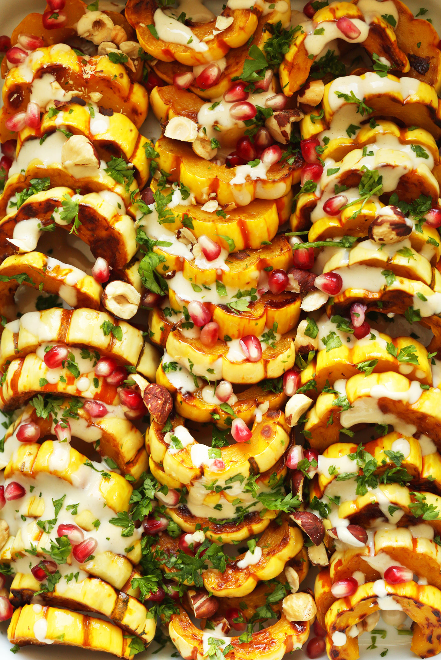 Close up shot of our beautiful and delicious gluten-free vegan Delicata Squash Bake