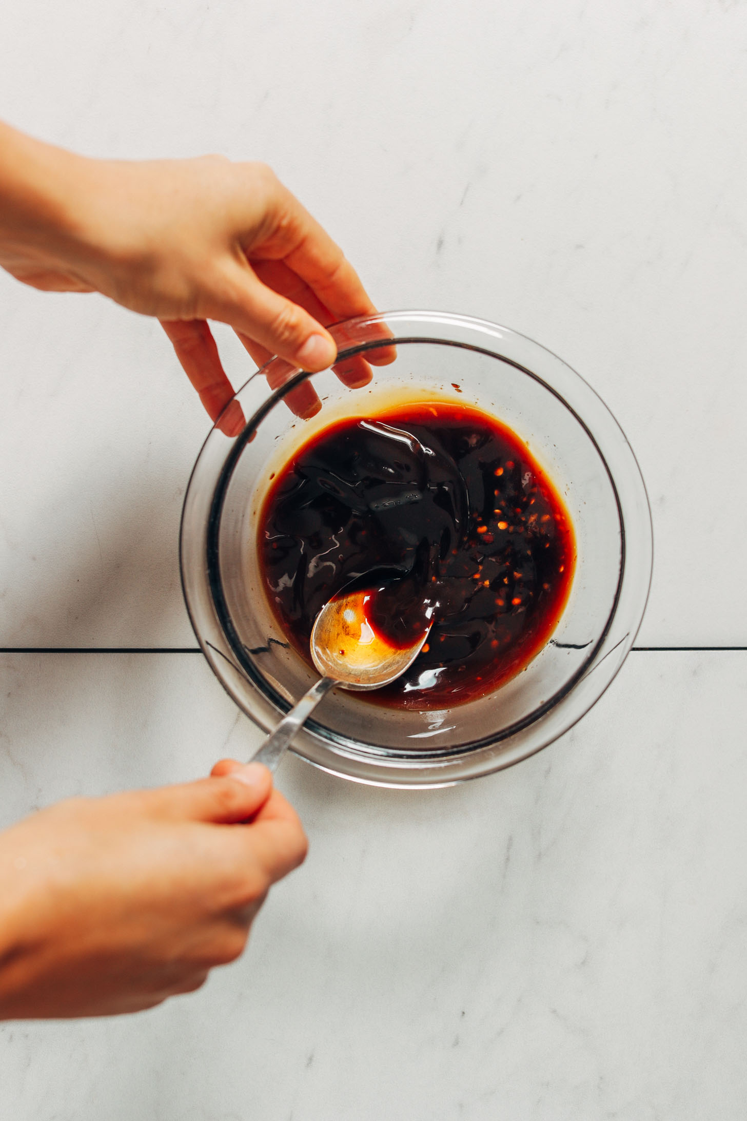 Stirring together ingredients for our easy homemade Pad Thai sauce