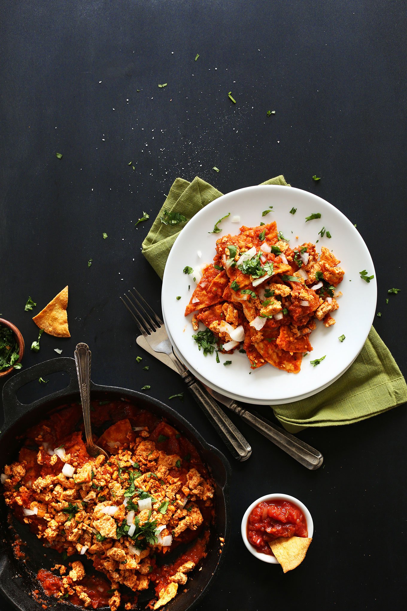 Plate and skillet filled with gluten-free Vegan Chilaquiles