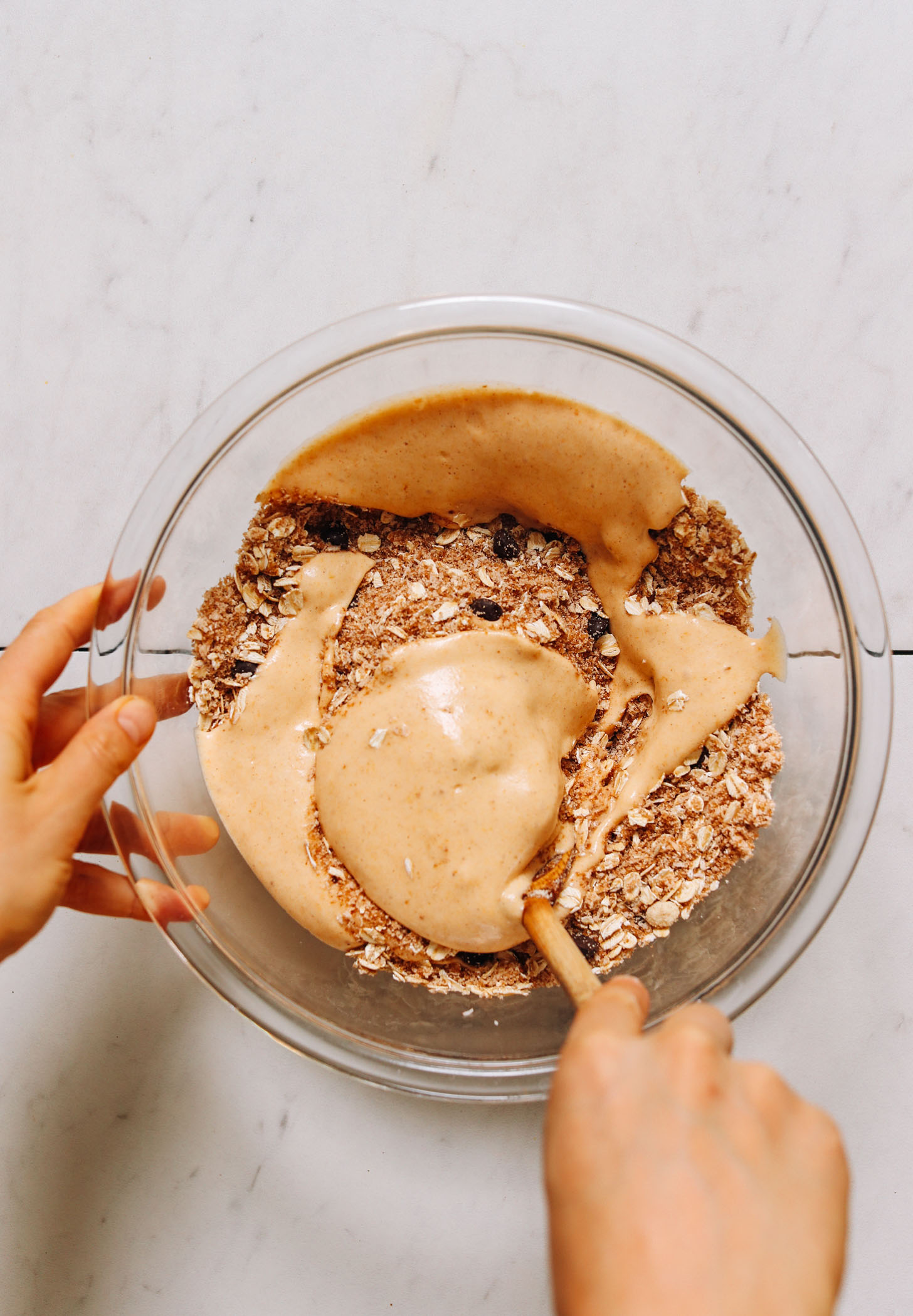 Mixing wet and dry ingredients for Vegan Gluten-Free Pumpkin Chocolate Chip Cookies