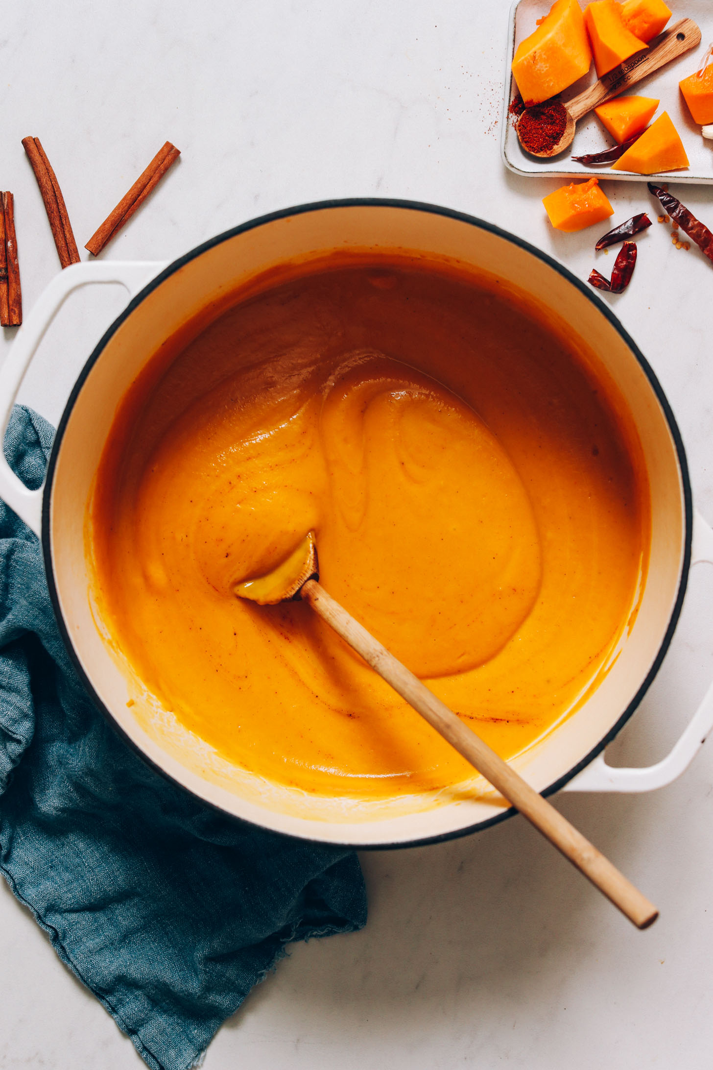 Pot of creamy carrot and butternut squash soup