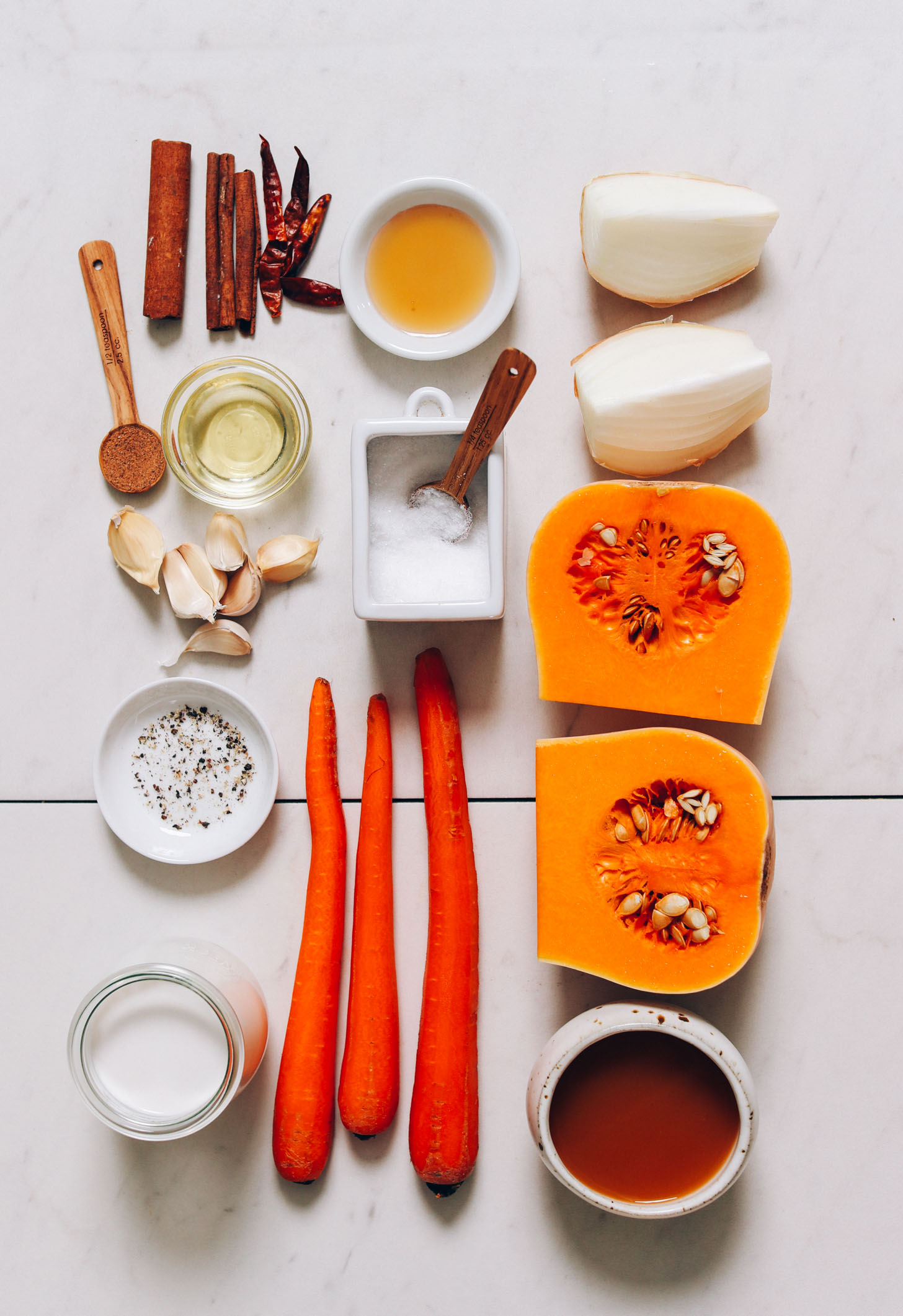 Cinnamon, cayenne, maple syrup, onion, butternut squash, vegetable broth, carrots, salt, pepper, coconut milk, garlic, avocado oil, and nutmeg