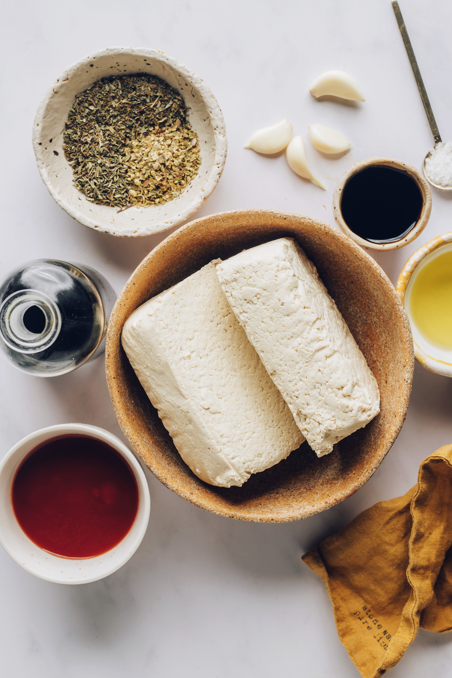 Tofu, tamari, balsamic vinegar, Italian herbs, garlic, olive oil, and salt