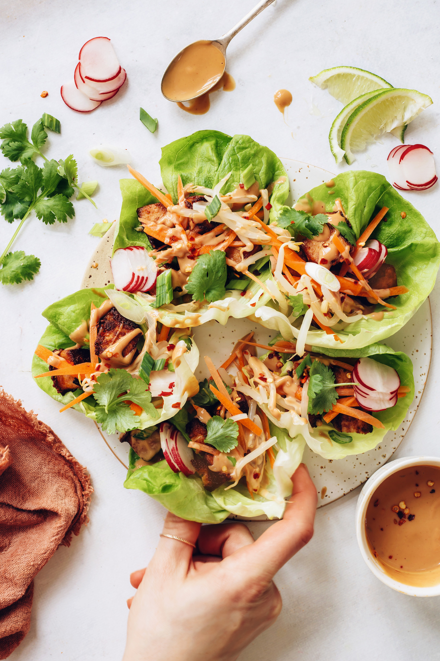 Picking up a Thai-inspired tofu lettuce wrap