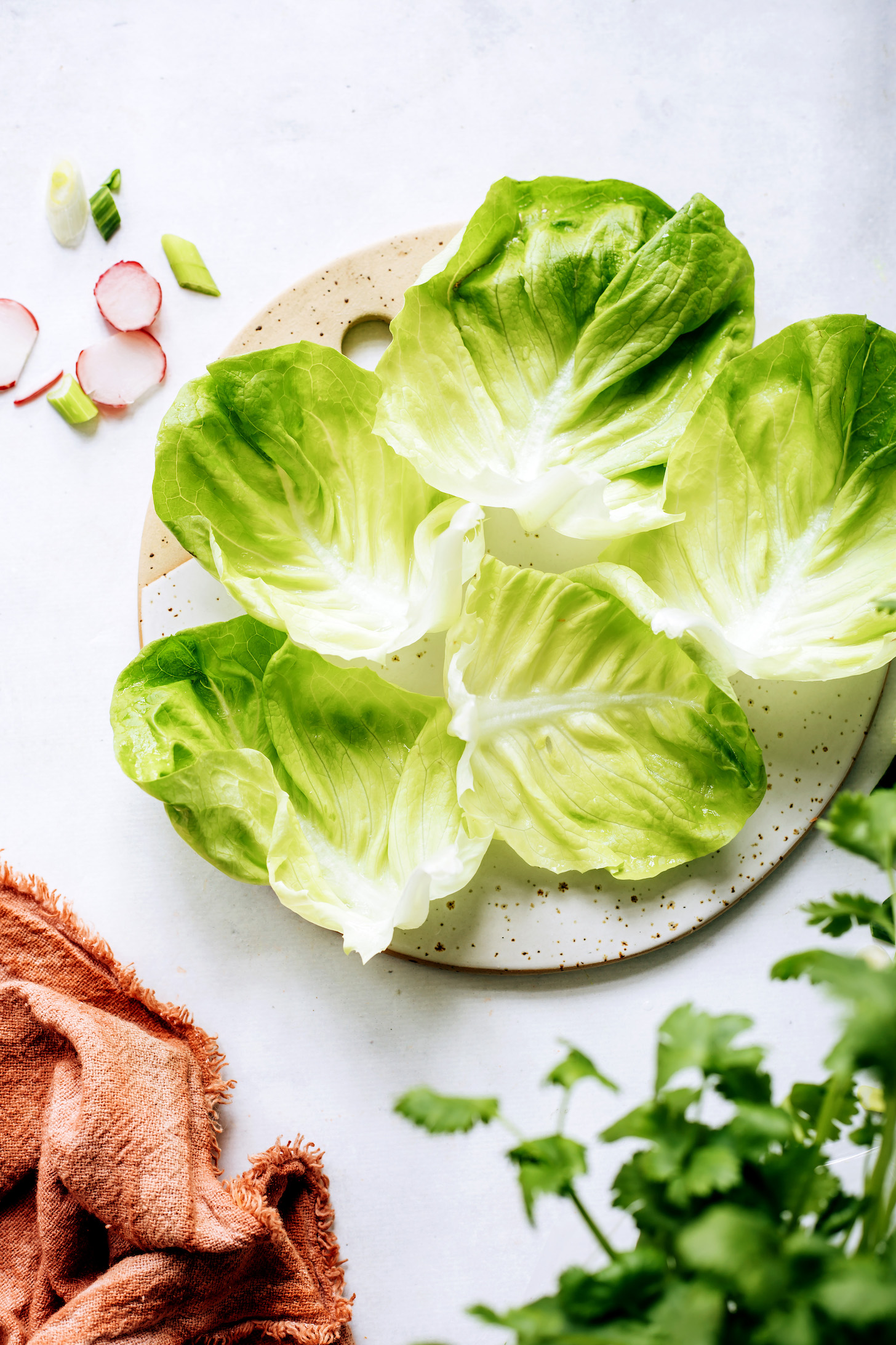 Cutting board with lettuce for wraps