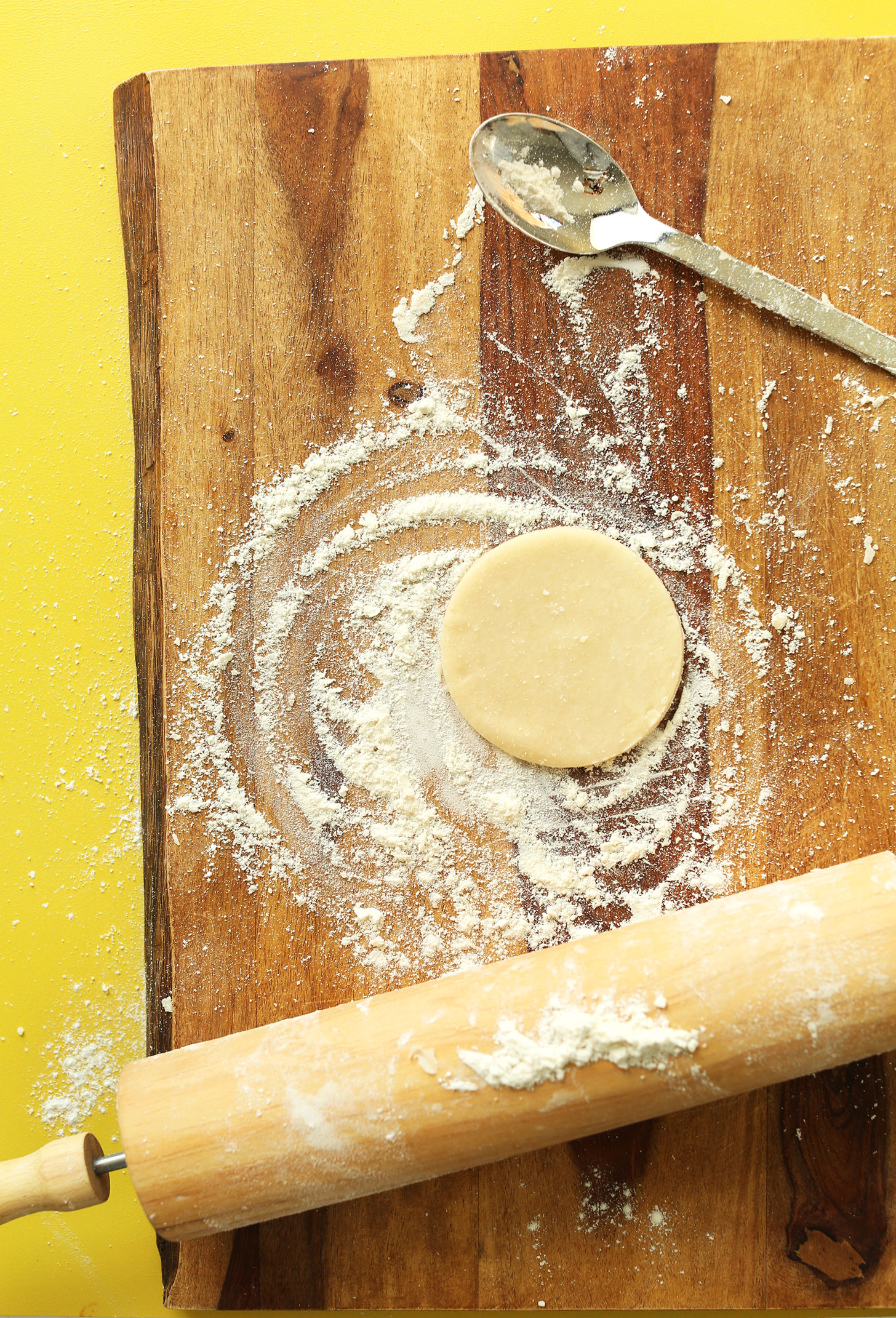 Small circular-shaped piece of Vegan Coconut Oil Pie Crust