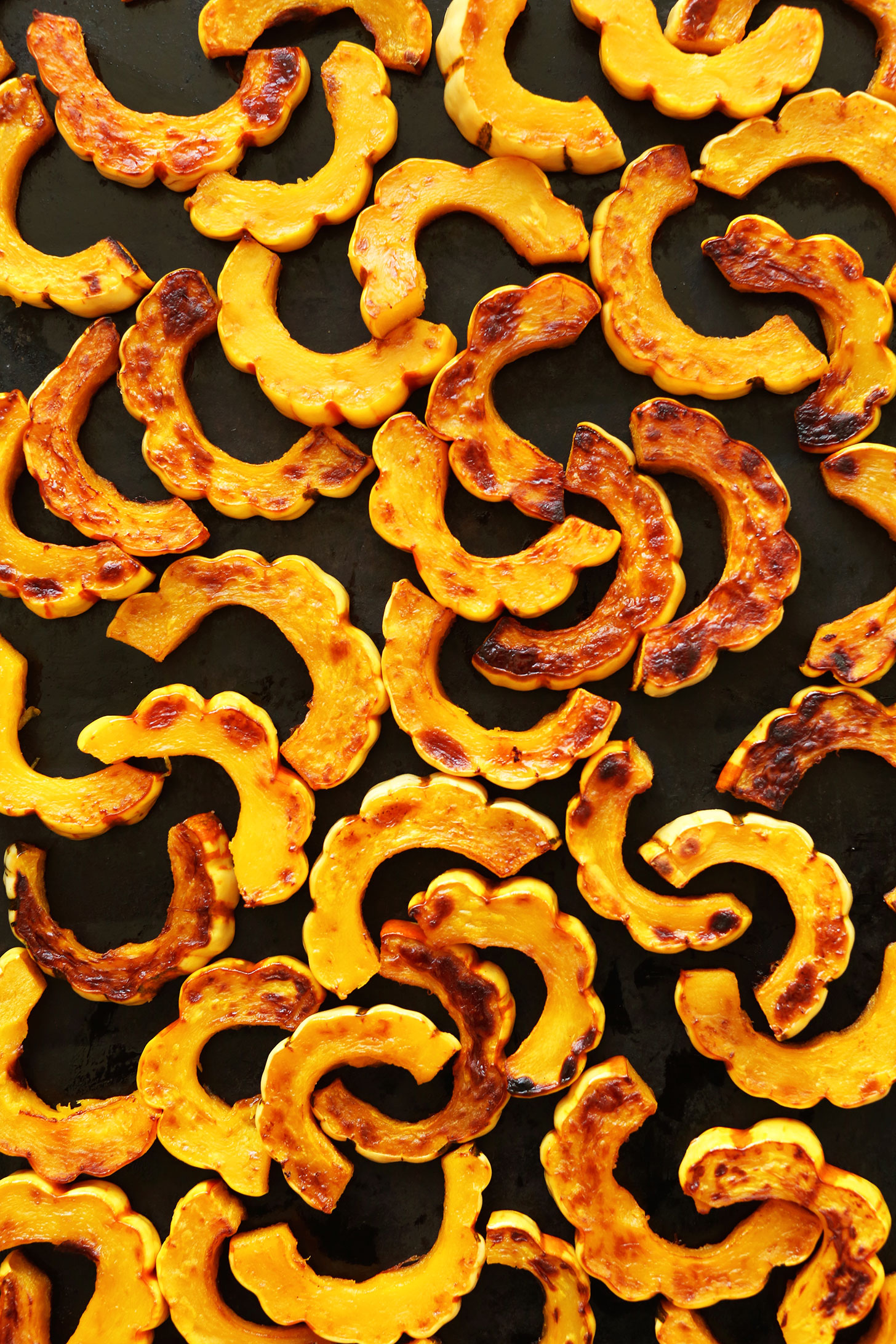 Baking sheet with freshly roasted Delicata Squash