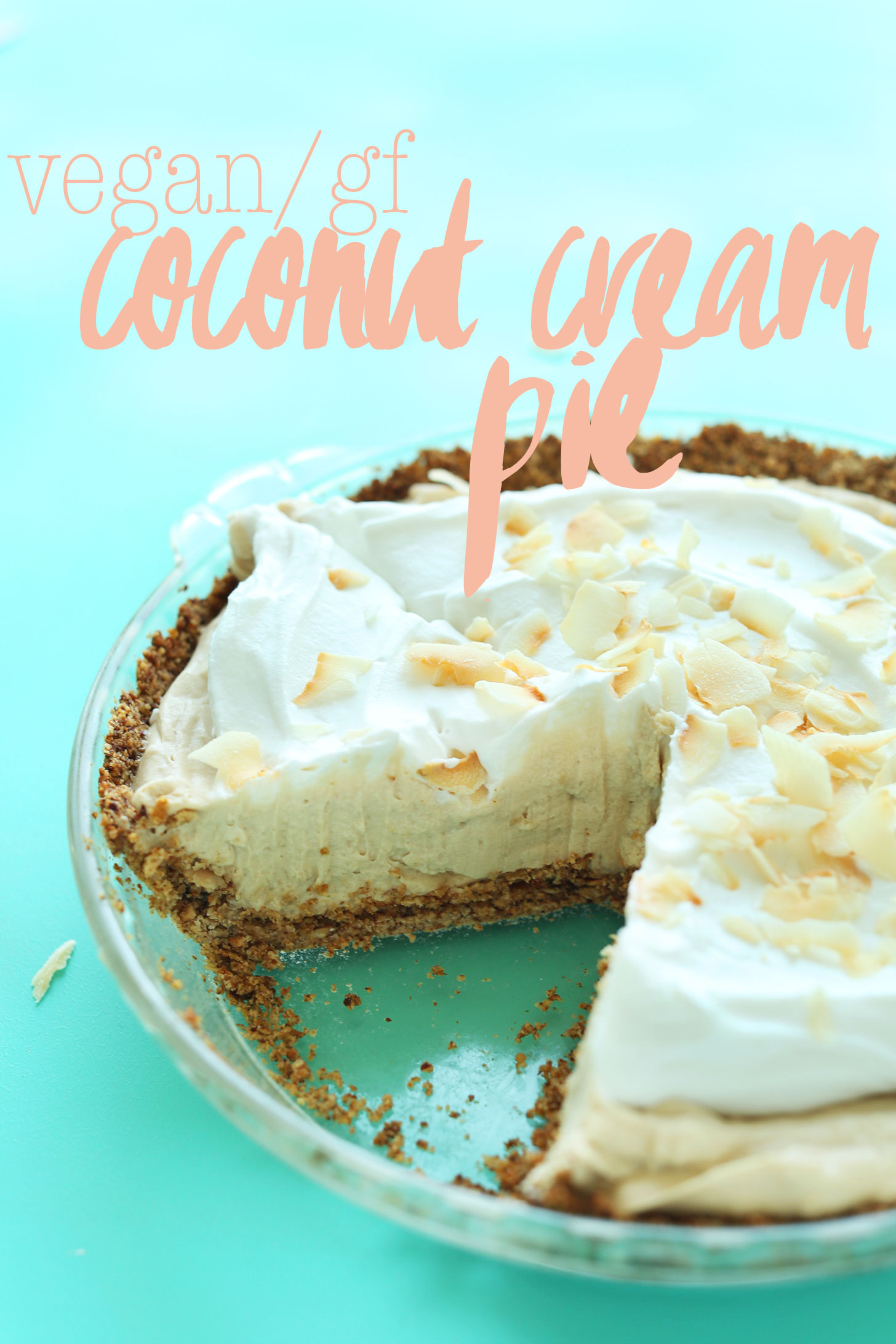 Vegan gluten-free Coconut Cream Pie with a slice removed from the whole pie