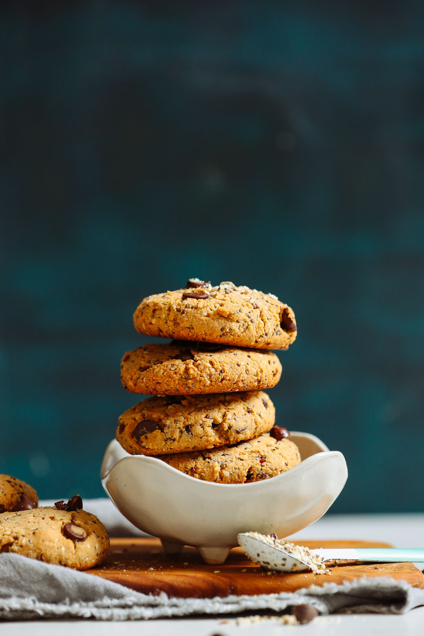 Homemade gluten-free vegan Trail Mix Cookies stacked in a bowl