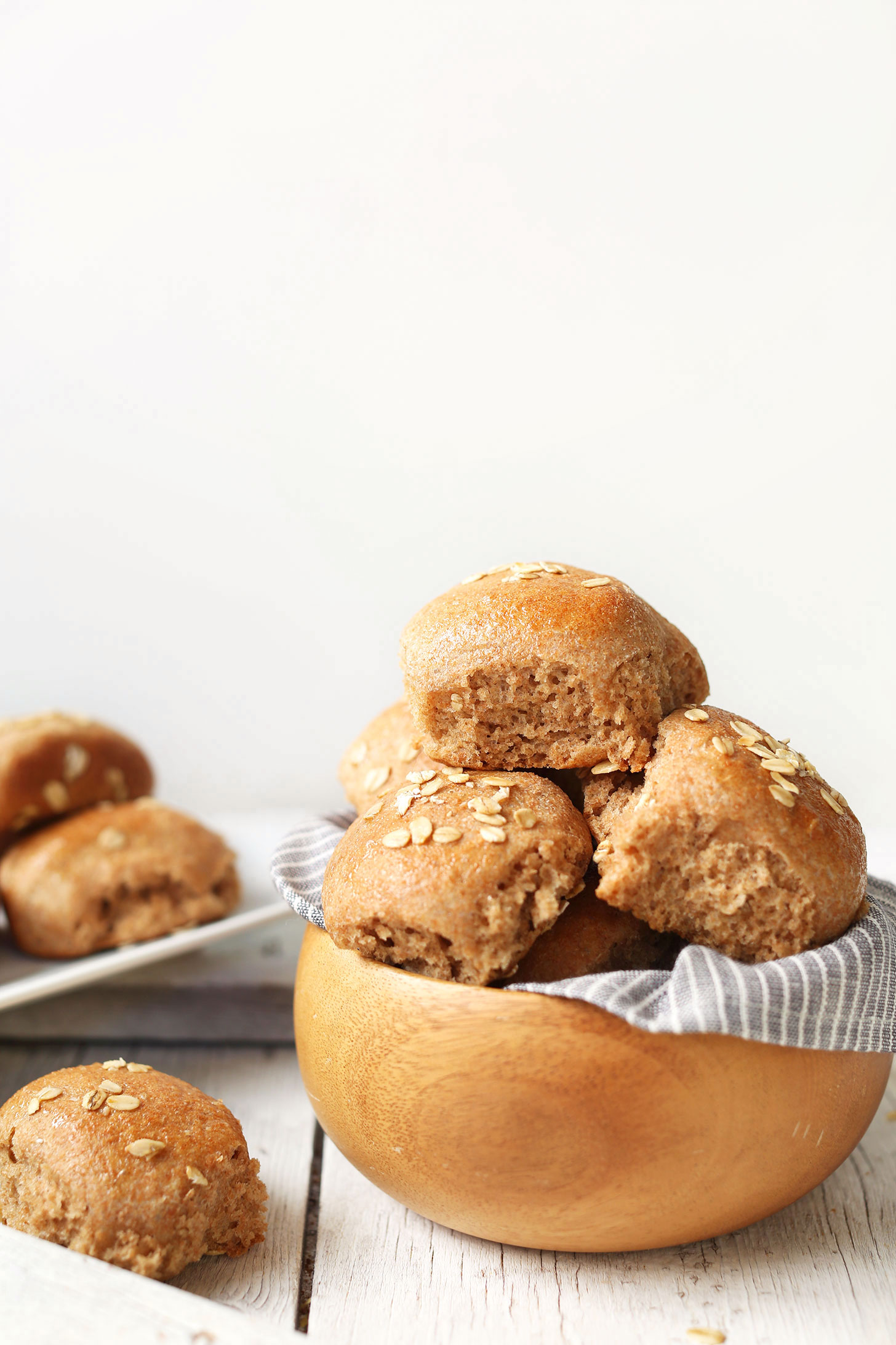 Bowl of fluffy and tender Spelt Dinner Rolls for a healthy Thanksgiving bread alternative