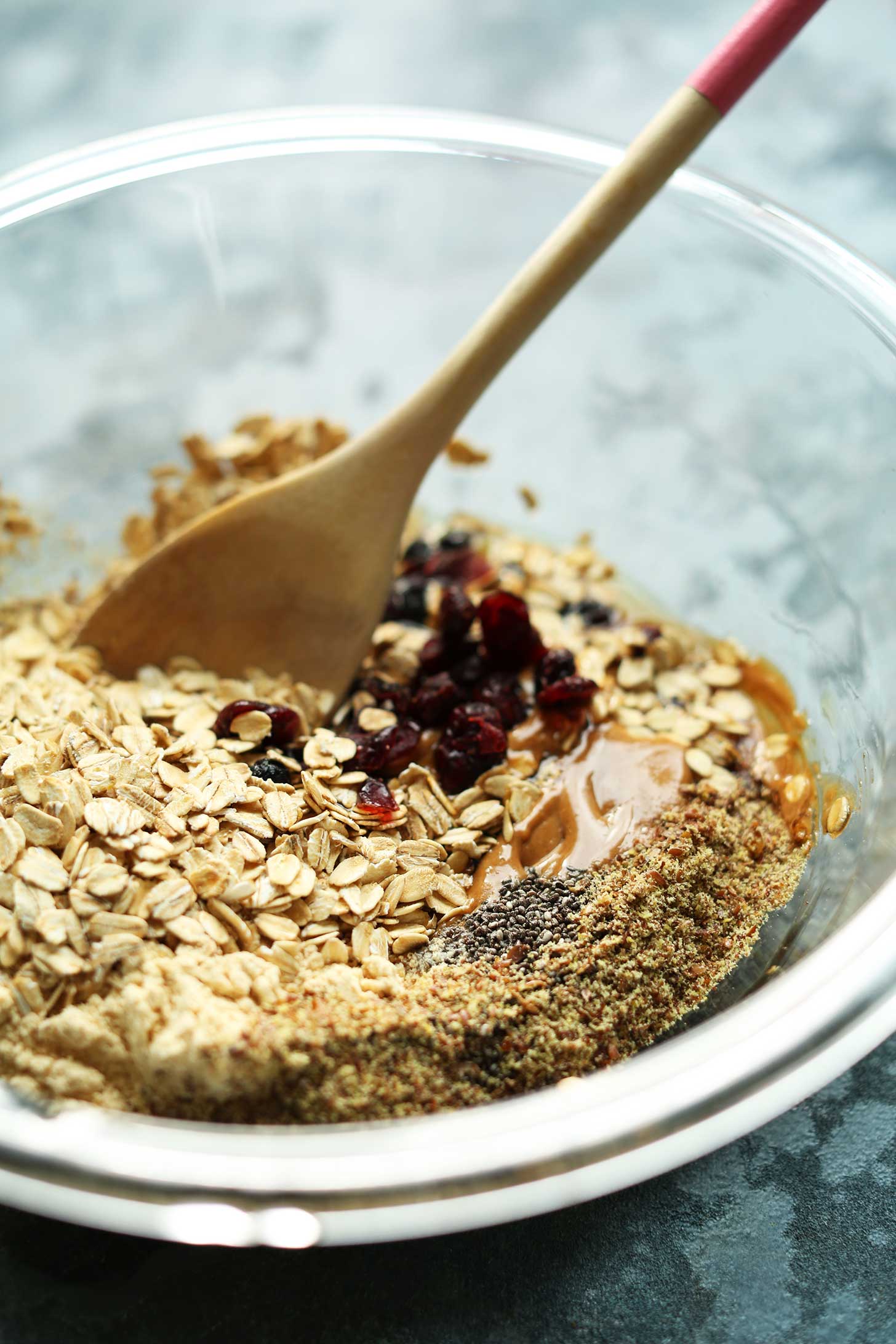 Stirring together ingredients for delicious and healthy PB&J Energy Bites