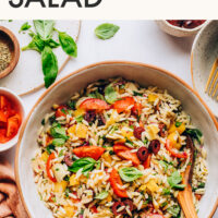 Bowl of colorful Mediterranean-inspired orzo pasta salad