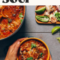 Dutch oven and bowl of our 1-pot dairy-free pumpkin chicken black bean soup