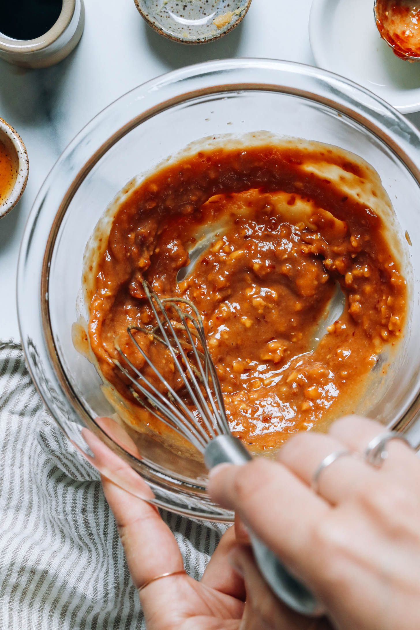 Whisking ingredients to make a gingery miso glaze