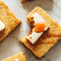 Slice of the best vegan cornbread with a bite taken out