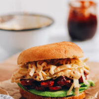 BBQ tempeh sandwich on a cutting board