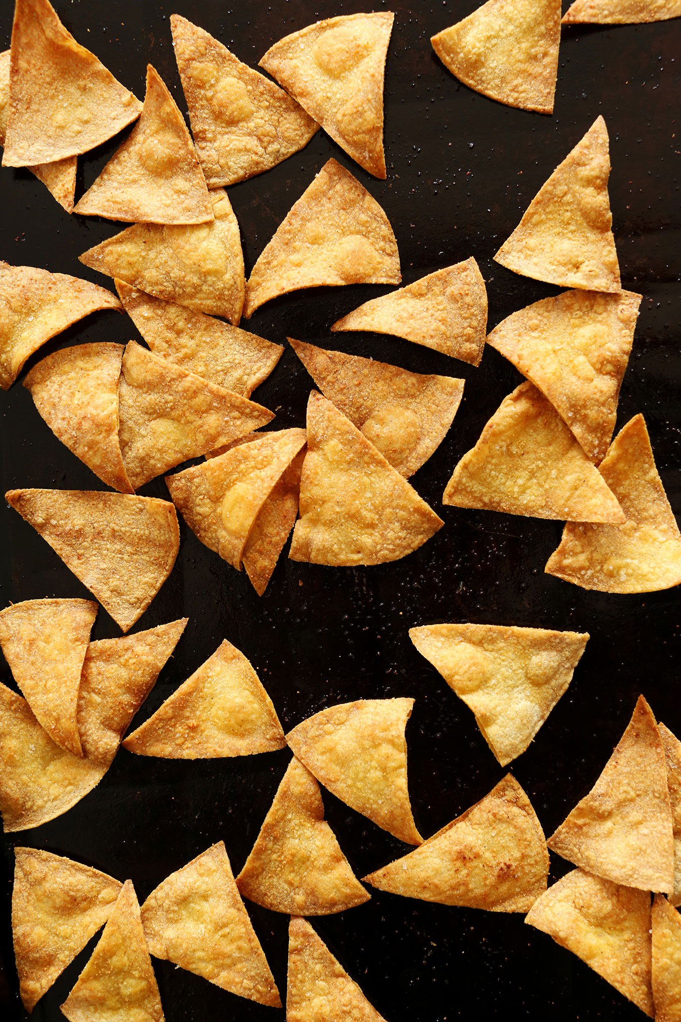 Baking sheet filled with homemade Baked Tortilla Chips