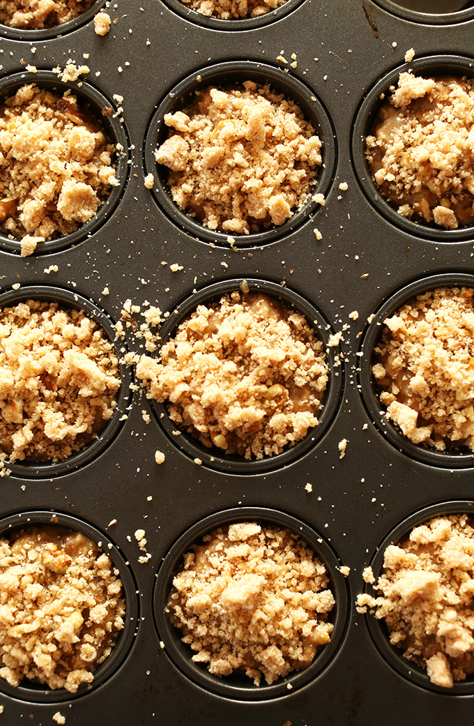 Muffin tin filled with Vegan Banana Crumble Top Muffins