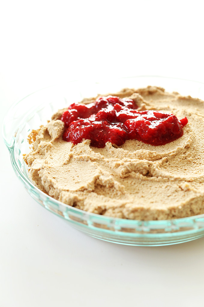 Pie pan filled with a batch of our Vegan Peanut Butter and Jelly Pie recipe